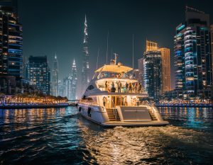 luxury yacht in dubai marina in night party cruise